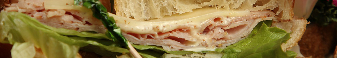 Eating Deli Italian Sandwich at Pasta Fresca & Piadina restaurant in Mystic, CT.